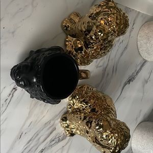 Two gold decorative China dogs